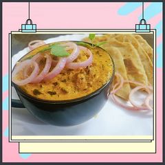 A picture of Restaurant Style Paneer Butter Masala with Layered Parantha.
