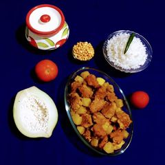 A picture of Papaya and Gram Dal Fritters Curry.