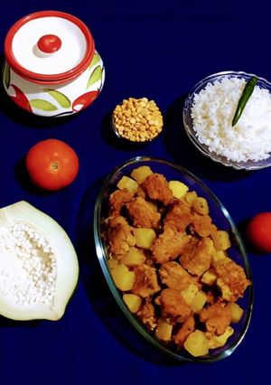 A picture of Papaya and Gram Dal Fritters Curry.