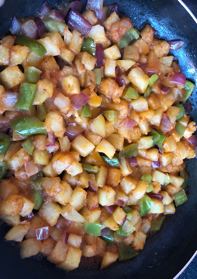 Una foto de Papas en salsa