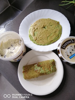 A picture of Rolled Ice Pancake w/ Ice Cream.