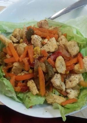 A picture of Lettuce,chicken & stir fry wrap.