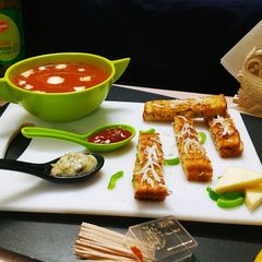 A picture of Cheese Stuffed Garlic Bread Sticks On Grill Pan (In Diff. Way).