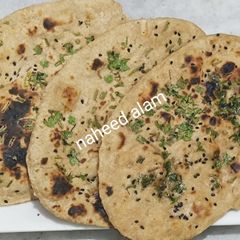 A picture of Multigrain Atta Naan On Tawa.