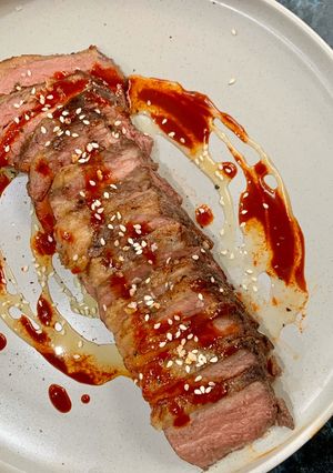 A picture of 20 hour sous vide beef brisket with salted honey and gochujang.