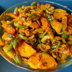 Tindola bataka nu shak (gourd with potato sabzi) A picture of Tindola bataka nu shak (gourd with potato sabzi).