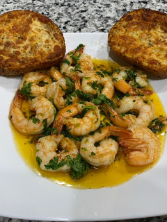 Una foto de Camarones al ajillo