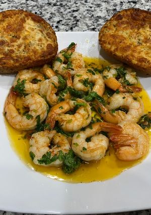 Una foto de Camarones al ajillo