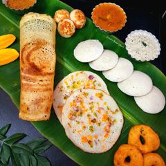 A picture of Maidu Vada with Flavors of South Indian Platter.