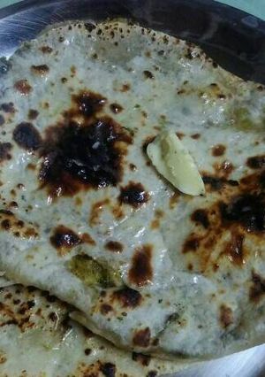 A picture of Stuff garlic naan # indian breads.