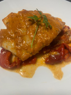 Una foto de Bacalao con romesco al horno
