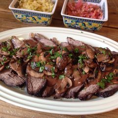 A picture of Sauerbraten (Burgunderbraten) with Mushrooms.