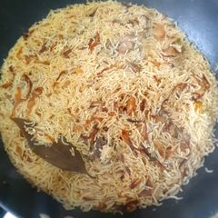 A picture of Aromatic Muradabadi Yakhni Pulao.