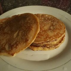 A picture of Pancake with honey.