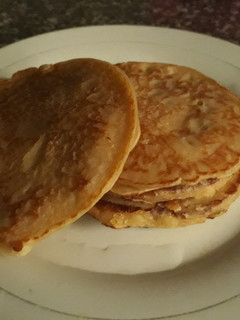 A picture of Pancake with honey.