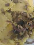 Ravioli al tonno e cipolle,con melanzana spadellata