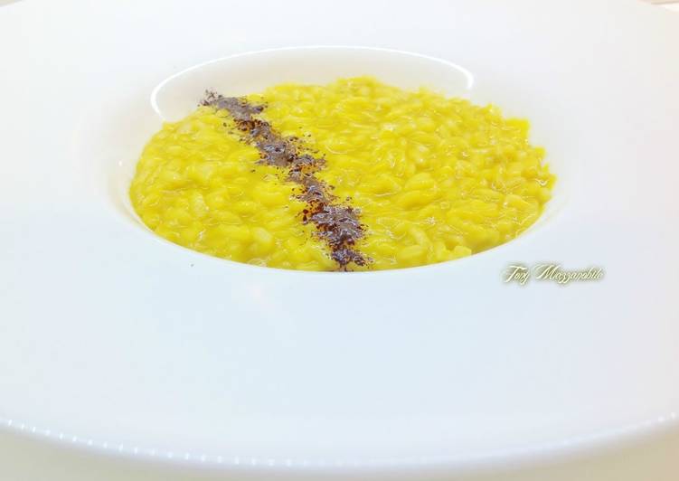 Risotto con zucca, castagne e cioccolato fondente al 90% di cacao