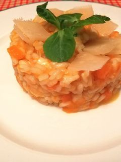 Foto di Risotto alla zucca, scamorza affumicata e scaglie di parmigiano