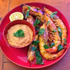 A picture of Giant wild prawns with peanut and coconut chutney.