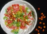 A picture of grapes and pomegranates