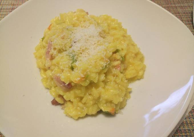 Saffron, zucchine (with flowers) and speck risotto