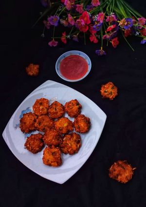 ভাজাপোড়া বাঁধাকপি ডালের পকোড়া রেসিপির প্রধান ছবি