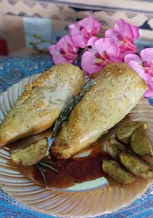Una foto de Rollo de chile poblano hojaldrado