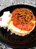 Pomelo caramelizado con base de galletita y chocolate blanco