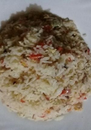 A picture of Fried Rice with scrabbled eggs.