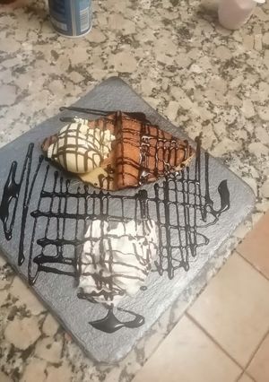 Una foto de Crepes de café con sirope de chocolate