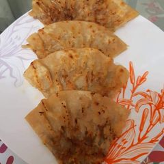 A picture of Crispy Crunchy Chicken Paratha.