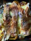 Corvina al horno gratinada en colchón de verduras