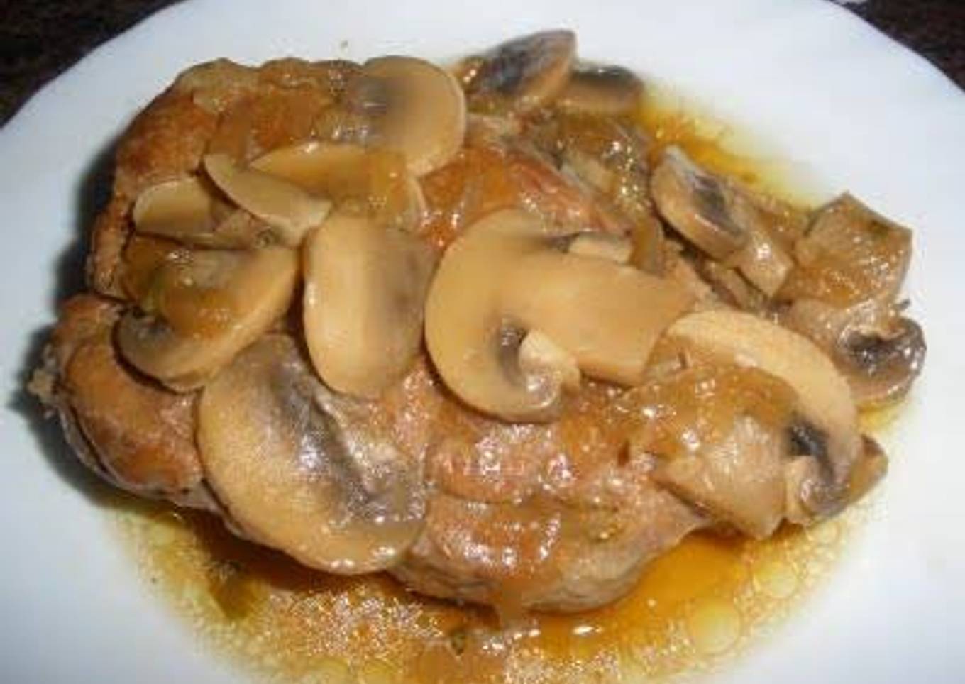 Lomo de cerdo con salsa de champiñones