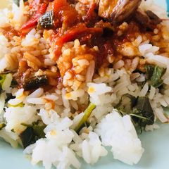 A picture of Vegetable rice with fish stew.