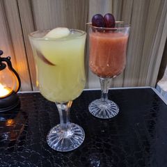 Orange drink and Fruits smoothie A picture of Orange drink and Fruits smoothie.