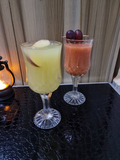 A picture of Orange drink and Fruits smoothie.