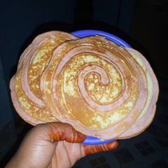 A picture of Strawberry and vanilla crepes.