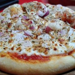 A picture of Veg onion pizza.