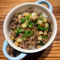 A picture of Easy Beef and Potato Bowl with Green Onion, Toasted Sesame Seeds, and Spicy Chili Crisp.
