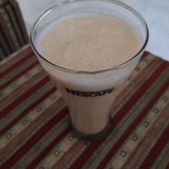 A picture of Banana and chikoo shake.