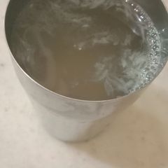 A picture of Hot water with lemon and honey.