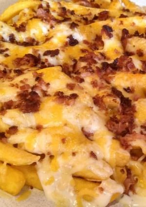 Una foto de Bacon cheese fries (estilo Foster)