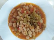 Una foto de olla express garbanzos tomate patata