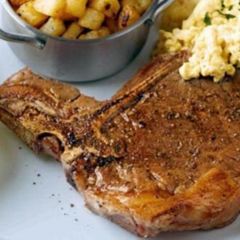 A picture of Best T Bone Steak with Hash Browns.