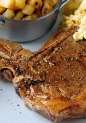 A picture of Best T Bone Steak with Hash Browns.