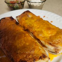 A picture of Brad's Pork Carnitas Grilled Burritos with Avocado Salsa.