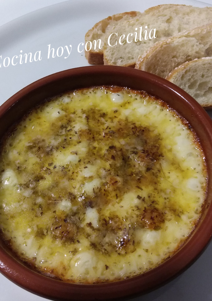 Una foto de Queso provolone con orégano, al horno