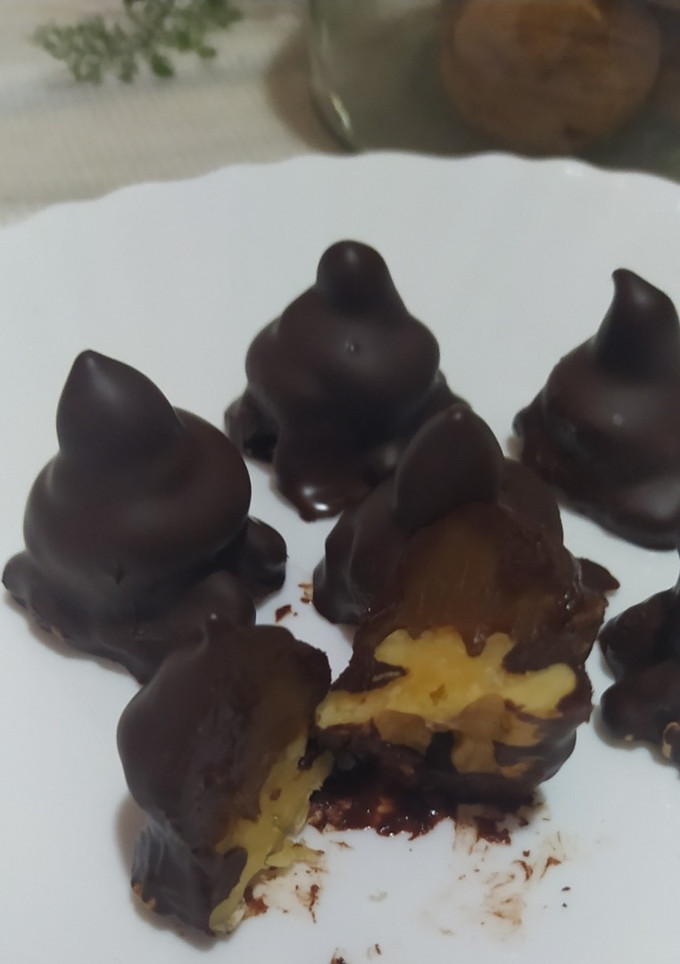 Una foto de Copitos De Nueces y Dulce De Leche Con Baño De Chocolate