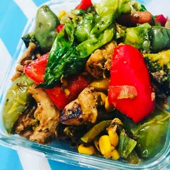 A picture of Stir fried chicken with veggies.