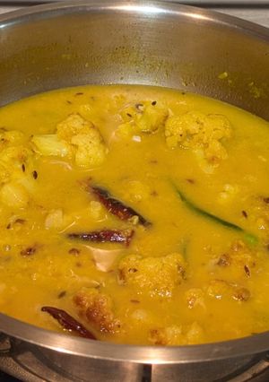 A picture of Moong Dal with peas and cauliflower.